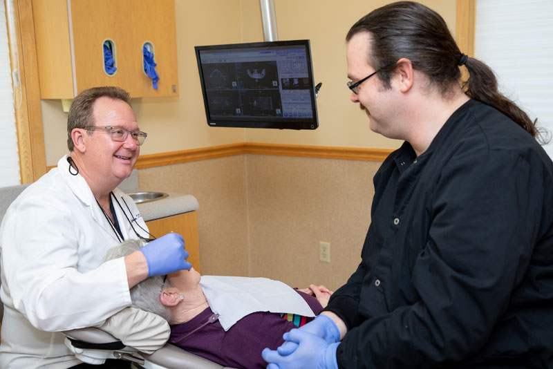 dr veneman performing dental implant procedure